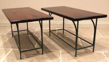 A pair of hardwood slab top side tables, mid to late 20th century, the polished slab tops raised