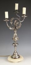 A German silver plate table lamp modelled as a Rococo influence candelabra, 20th century, the