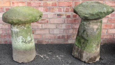 Two 19th century sandstone staddle stones, of mushroom form, upon tapering pedestals (at fault) (2)