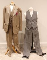 A gentleman's three piece tweed suit by The London Tailor Shop, silk lined, maker's label to