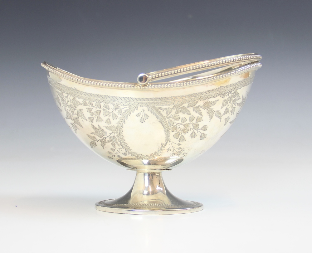 A Victorian silver swing-handled sugar basket, Fenton Brothers, Sheffield 1878, of oval form on