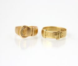 An 18ct yellow gold buckle ring, with realistic detail and rubbed engraved decoration, ring size