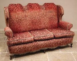 A Queen Anne Revival lounge suite, early 20th century, in embossed foliate fabric, comprising; a