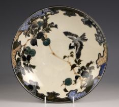 A Japanese Taizan bowl, 20th century, the circular bowl decorated with a bird in flight amidst