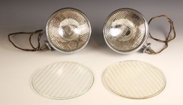 A pair of vintage Lucas car headlamps, believed to be from a Bentley, the chrome bodies stamped '