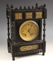A Lenz Kirch ebonised Aesthetic Movement bracket clock, late 19th century, the castellated case with