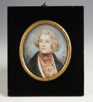 English school (mid 19th century), A bust length portrait miniature depicting a young gentleman in