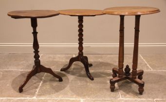 Three 19th century wine/occasional tables, to include an example with a circular moulded top upon