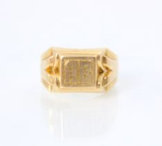 A French 18ct yellow gold signet ring, the rectangular raised cartouche with 'AB' initial, leading