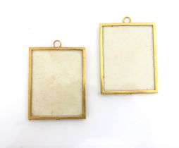 A pair of yellow metal mounted photograph frames, the plain polished mounts, stamped 'M&M 9c' to