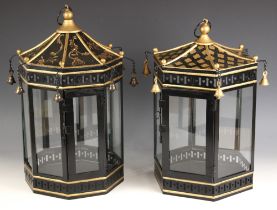 A matched pair of japanned toleware lanterns, late 20th/early 21st century, each of octagonal pagoda