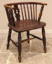 A 19th century ash and elm Windsor captains chair, with a 'U' shaped top rail, stick back and