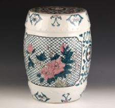 A Chinese porcelain opium stool, 20th century, of barrel form and decorated with vignettes of