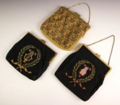 An early 20th century tapestry handbag, woven with repeating fruiting foliage against a gold ground,