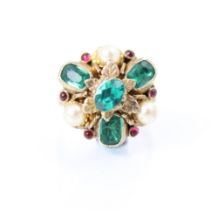 A 19th century untested emerald and ruby stylised cluster ring, the three emerald cut green stones