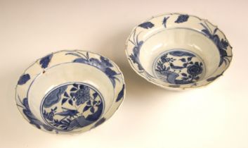 A pair of Chinese porcelain blue and white bowls, Wanli period (1572- 1620), each of shaped circular