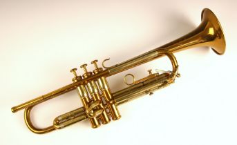 An American trumpet by Olds & Son of Los Angeles, serial number 5024, with two mouth pieces and