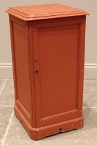 A Victorian painted pine pot cupboard, the moulded top over a panelled door opening to a single