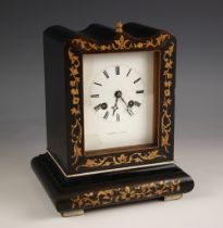 A French campaign clock, 19th century, signed Thomas, Paris, the shaped case inlaid with boxwood