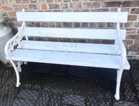 A painted Coalbrookdale style cast iron and hardwood garden bench
