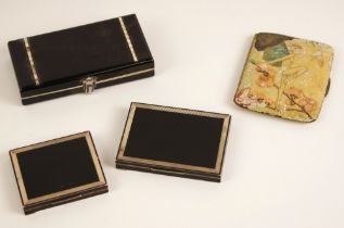 An Art Deco style compact, the black case with baguette cut paste detail, opening to reveal