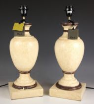 A pair of Oka Gela table lamps, each of vase form, upon integral plinth base, with original retail
