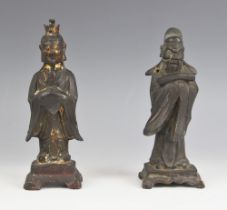 A Chinese bronze figure of Wenchang Wang, possibly Ming Dynasty, modelled standing, evidence of