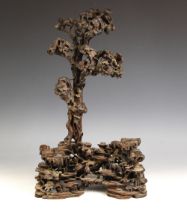 A Chinese carved wood naturalistic tree form carving, 19th century, the large detachable branch
