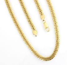 A 9ct yellow gold curb link necklace, with lobster fastener, stamped ‘LA’ with import marks, 58.