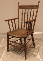 An elm and beech kitchen elbow chair, late 19th/early 20th century, the concave back rail upon