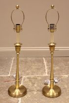 A pair of Ralph Lauren lacquered brass table lamps, modelled in the form of 19th century