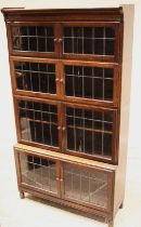 An oak Globe Wernicke type bookcase, early 20th century, formed with four graduated tiers, each with