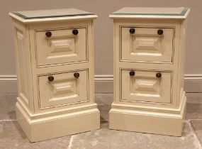 A pair of painted bedside cupboards, possibly Theodore Alexander, early 21st century, each of