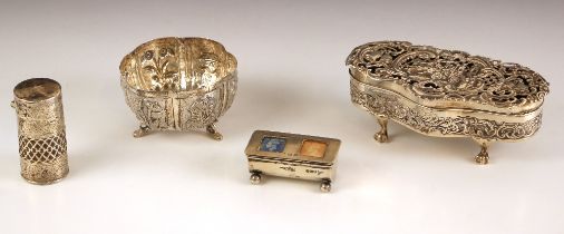 An Edwardian silver trinket box, William Comyns and Sons, London 1907, the trefoil shaped hinged