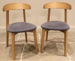 A pair of contemporary light oak and upholstered dining chairs, made in Italy for Heal's, early 21st