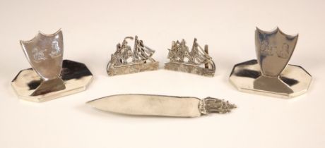 A George V silver book mark, Dudley and Cox, London 1928, the terminal modelled as openwork ship,