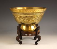 A Chinese polished bronze jardinière, 19th century, Ming six-character, the tapered circular bowl