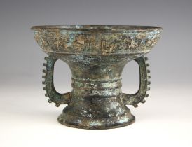 A Chinese Archaic Yuan Dynasty style patinated bronzed vase, 19th century, modelled in the form of a