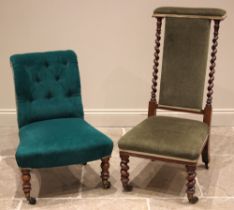 A Victorian simulated rosewood button back low seat chair, in turquoise velour fabric, upon turned