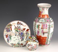 A Chinese porcelain Canton vase, 20th century, of baluster form and decorated in the famille rose