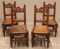 A set of four pitch pine ecclesiastical hall/side chairs, late 19th/early 20th century, the rail