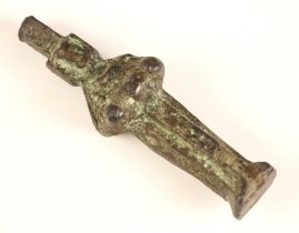 A South East Asian patinated bronze pipe tamper/opium weight, 18th century, modelled as a deity