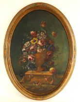 Continental school (19th century), An oval still life with flowers spilling from a classical urn,