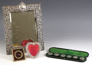 A selection of silver items, including a silver mounted mirror, possibly Deakin and Francis,
