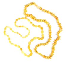 A string of butterscotch coloured amber beads, the non uniform disc shaped beads, with a further