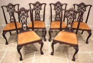 A set of eight mahogany Chippendale style dining chairs, early 20th century, each with a ribbon