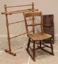 A Victorian elm and beech rail back rocking chair, 72cm H, (at fault), a Victorian pine towel