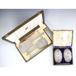 A George VI silver mounted dressing table set, W I Broadway & Co, Birmingham 1939, comprising a hair