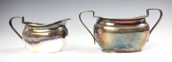 A George VI silver sugar bowl, Atkin Brothers, Sheffield 1939, the groove handles above conforming