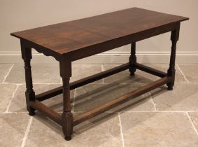 An 18th century style country oak and elm table, late 19th/early 20th century, the rectangular top